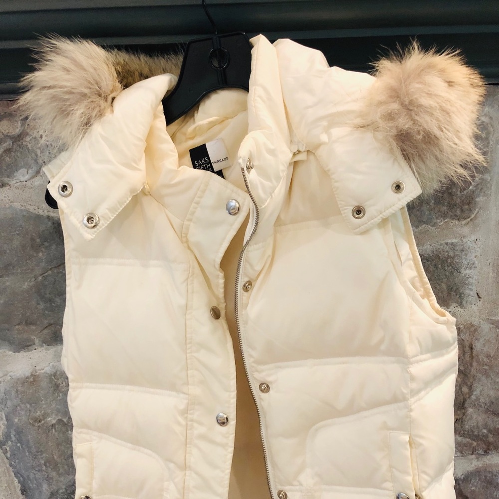 Down vest with genuine fur trim